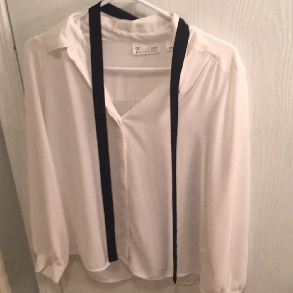 White blouse black tie